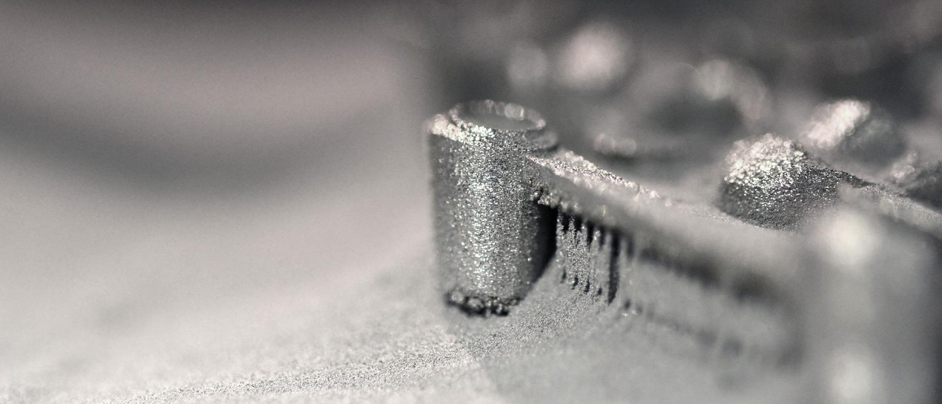 Additive manufacturing processes for the production of metallic components